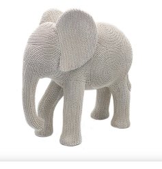 An elephant ornament in a lovely shade of grey, with a woven finish making it an ideal complement to any home.