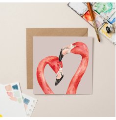 A colourful greeting card featuring two flamingos in different pink hues.