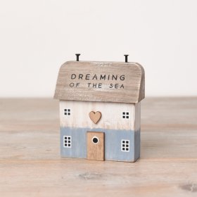 Dream of the sea with this charming coastal inspired wooden house with a blue and white washed finish 