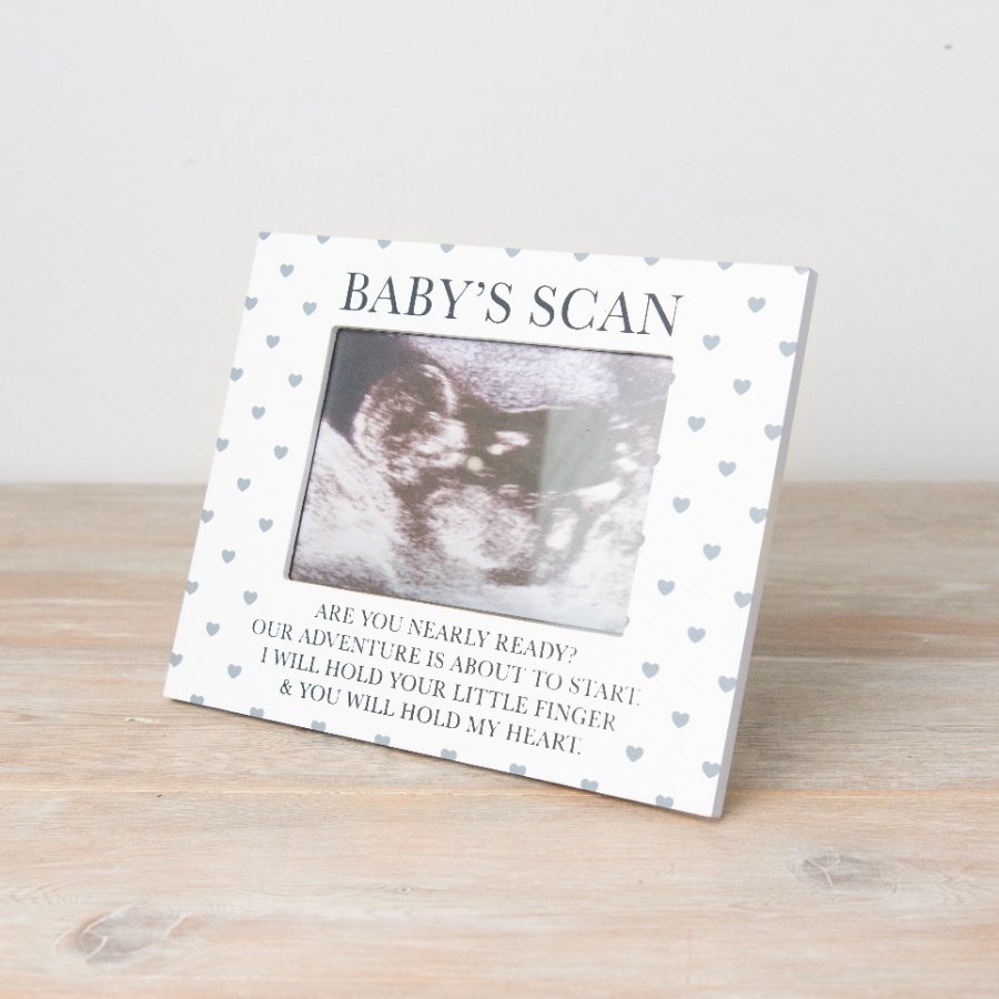 A chic wooden photo frame with a charming poem and pretty polka dot heart design.