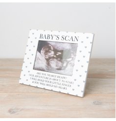 A chic wooden photo frame with a polka dot heart design. Complete with poem. 