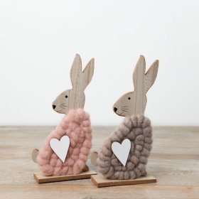 A delightful pair of wooden bunny ornaments