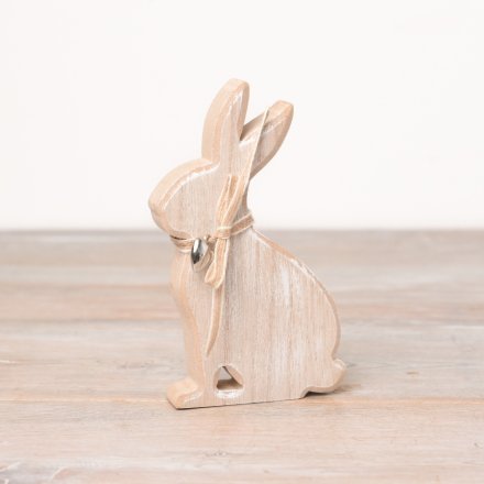 A charming wooden bunny ornament with a washed finish. Complete with a country style bow and silver heart charm. 