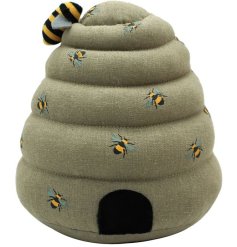 A country style doorstop in a beehive design.