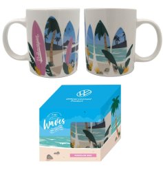 The waves are calling! A coastal mug with camper illustrations in a surf board cut out design. 
