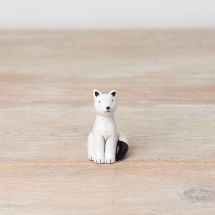 A charming and unique porcelain fox ornament with cute painted features and a speckled finish. 