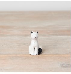 A charming fox ornament with black painted details and a speckled finish. 