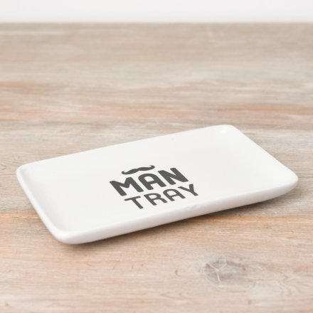 A contemporary ceramic tray for all your essentials. A bold design with a moustache motif. 