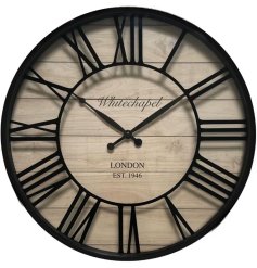 A rustic chunky wall clock in black with a natural wooden back. 