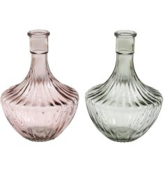 This beautiful assortment of ribbed glass vases is the perfect addition to any boho-style home.