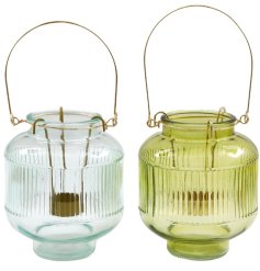 A lantern style t- light holder with a ribbed pattern, in 2 assorted designs. 