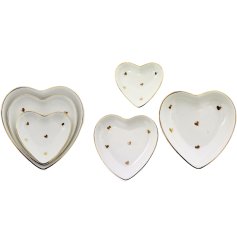 A set of 3 gorgeous trinket dishes in a heart shape. 