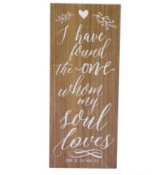A natural style wedding plaque made from wood, with a romantic quote and heart motif. 