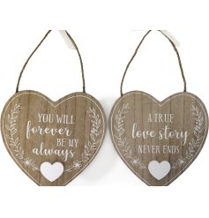 2 assorted heart shaped wooden decorations with romantic sayings, perfect for part of a wedding ceremony decor. 