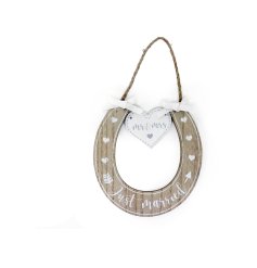 A traditional wooden horseshoe wedding decoration with a jute hanger.