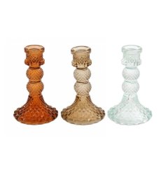 3 assorted glass candle holders in a ribbed crystal design. 