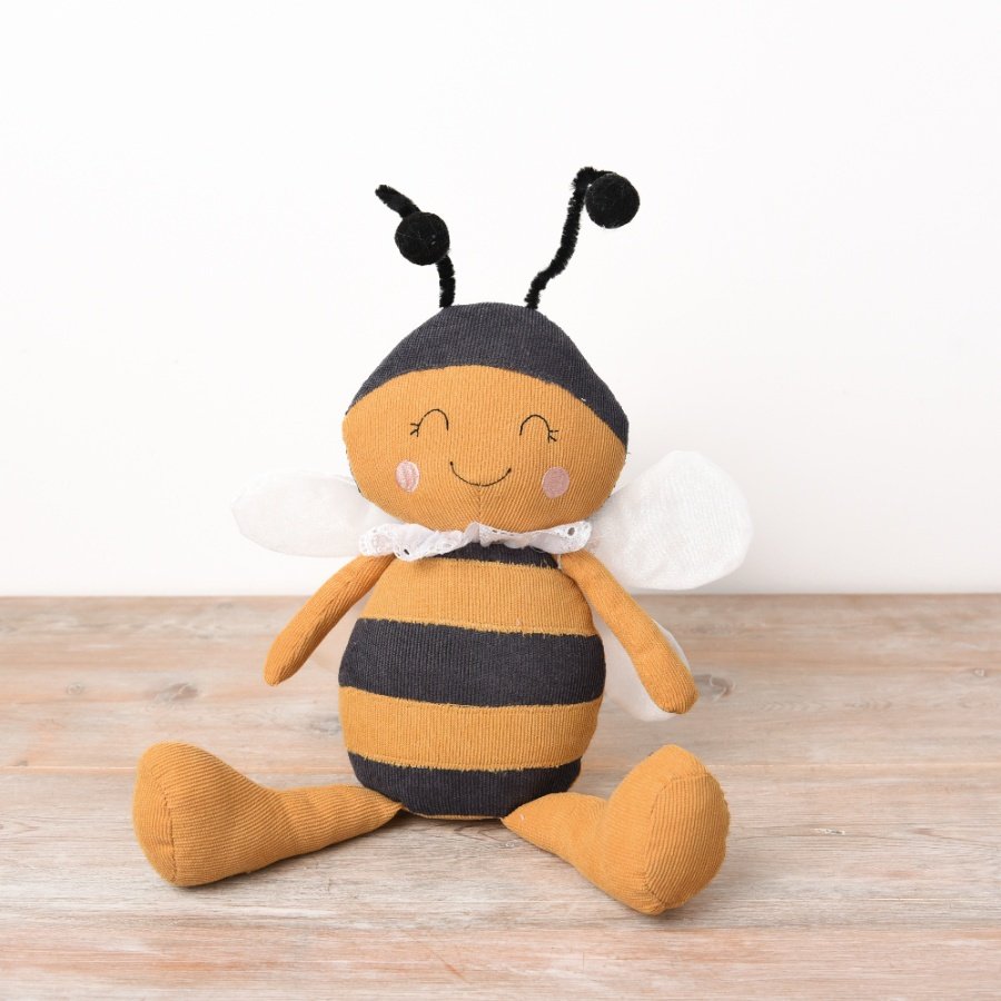 A bright and beautiful bumble bee decoration. Crafted with textured materials and complete with a stitched cute face.