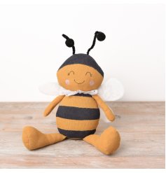 A charming bee decoration with a cute stitched face, ribbed body and fabric details. 