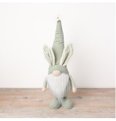 A Spring themed gonk decoration with charming bunny ears. Made from pretty pastel green fabric with gingham details.