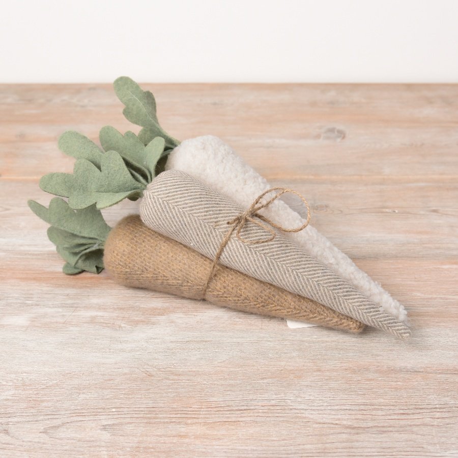 Add texture, character and charm to the home with this bundle of fabric carrots in neutral colours. 