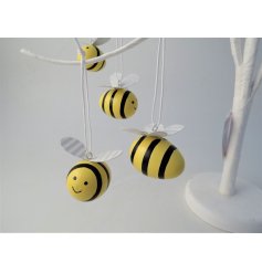 This adorable little bumble bee decoration hung by white string is perfect for adding a spring feel to the home