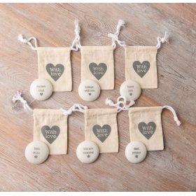 A mix of 6 smooth pebble style sentiment slogans, each with an individual printed cotton gift bag. 