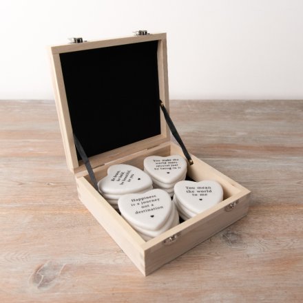 A box of 6 assorted marble hearts each with a popular motivational or sentimental slogan.