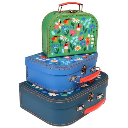 A stack of three colourful storage cases decorated with fairies and flowers.
