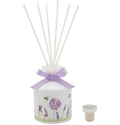 Let this diffuser fill each room with a delightful scent. Detailing a lavender and bee design with a purple bow