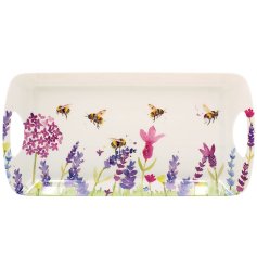 A medium sized tray full of bright colours and spring meadow detail.