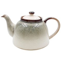 Enhance your kitchen collection with the addition of a stunning tea pot featuring a distinctive reactive glaze.