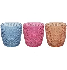 Infuse vibrant hues into any room with these charming and colourful candle holders.