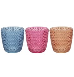 A delightful assortment of 3  candle holders that are sure to brighten up any room