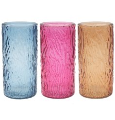 A tall texture vase in 3 assorted colours, pink, blue & orange. 