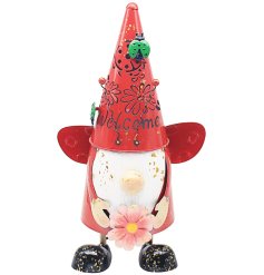 This delightful metal gnome is sure to bring a touch of cheer to any garden.