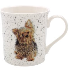 A rustic fine china mug detailing a yorkshire terrier surrounded by grey flecks.