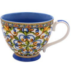 A stylish mug from the Tuscany range, featuring a blue, green and orange colour tone with intricate patterns