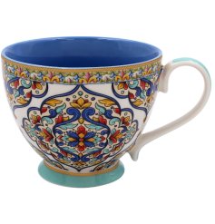 A lively and fashionable Tuscany-style mug that serves as an ideal addition to any kitchen.