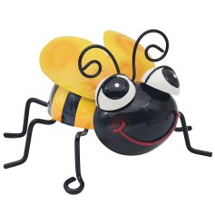 Crafted from metal, a glazed bumble bee decoration ready to be showcased in the garden. 
