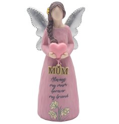 An angel figurine wearing a pink gown, holding a heart which has a 3D mum text underneath. 