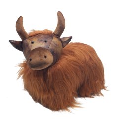 An XL highland cow doorstop adorned with luscious faux fur.  
