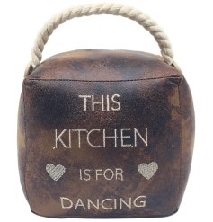 A cube shaped doorstop made from faux leather with stitched text.
