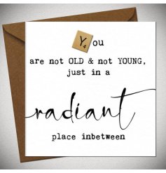 A birthday greetings card with a humorous quote and a vintage letter tile incorporated into the wording. 