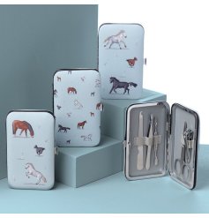 A 5 piece manicure set from the Willow Farm collection. It features a horse inspired design and has a push button clasp 