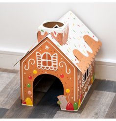 A festive Christmas cat den in a gingerbread house design. 