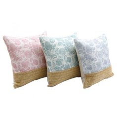 A scatter cushion in 3 assorted colours, with a paisley pattern. 