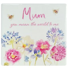 A ceramic coaster decorated in pretty flowers and bees with the wording 'Mum you mean the world to me'