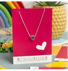 A silver plated heart necklace backed onto a red A7 card.