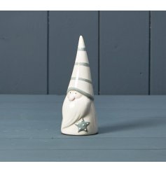 A chic and contemporary ceramic Santa ornament with grey details including stripes and a spotty star.