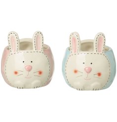 A charming assortment of 2 decorative bunny pots in a baby pink and blue colour tone. 